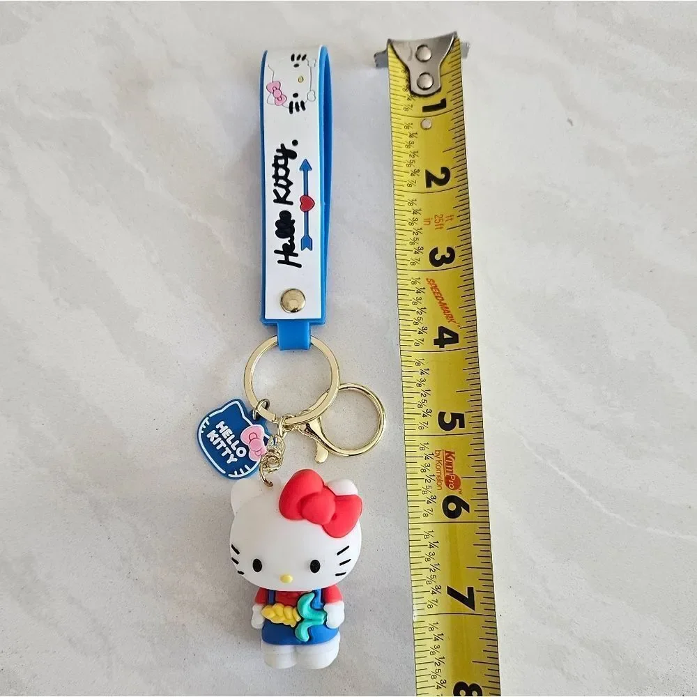 Hello Kitty Holding Corn Keychain with Blue Strap